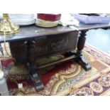 A SMALL OAK REFECTORY TABLE.