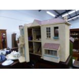 A VINTAGE DOLLS HOUSE.