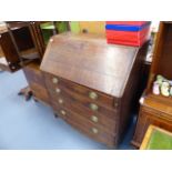 A LATE GEORGIAN COUNTRY OAK BUREAU.