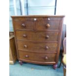 A VICTORIAN MAHOGANY TALL BOW FRONT CHEST OF DRAWERS.