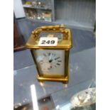 A BRASS CASED CARRIAGE CLOCK.