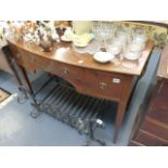 A REGENCY MAHOGANY BOW FRONT SIDE TABLE.