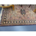 A HAND WOVEN EASTERN SMALL RUG.
