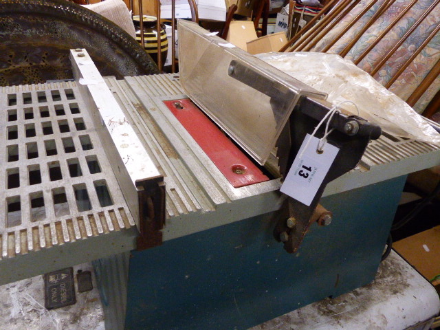 A DRAPER BENCHSAW ON STAND.