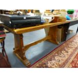 A PALE OAK REFECTORY TYPE TABLE.