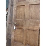 A PAIR OF PINE PANELLED DOORS.