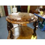 AN EASTERN HARDWOOD COFFE TABLE WITH ELEPHANT FORM LEGS.