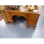 AN OAK PEDESTAL DESK.