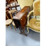 A CONTINENTAL ARMCHAIR AND AN EDWARDIAN SUTHERLAND TABLE.