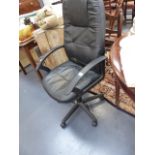 AN OFFICE SWIVEL CHAIR.