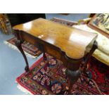 AN 18th.C.MAHOGANY AND INLAID FOLD OVER GAMES TABLE.