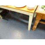 A MODERN PINE TOPPED KITCHEN TABLE.