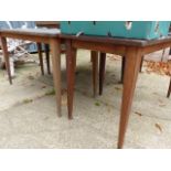 FOUR MATCHING TEAK GARDEN TABLES.