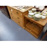 AN EDWARDIAN SMALL CHEST OF DRAWERS AND A PINE BEDSIDE CABINET.