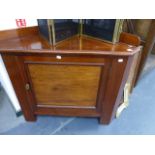 A MAHOGANY CORNER CABINET.