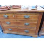 AN EDWARDIAN CHEST OF DRAWERS.