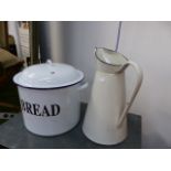 AN ENAMEL BREAD BIN AND A JUG.