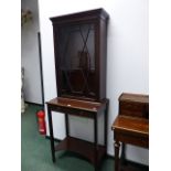A CHINESE CHIPPENDALE STYLE DISPLAY CABINET ON STAND.