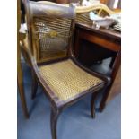 AN OAK ARMCHAIR AND A REGENCY PAINTED SIDE CHAIR.