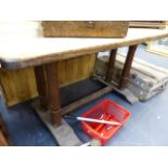 AN OAK REFECTORY TYPE TABLE.