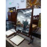 A MAHOGANY SWING MIRROR.