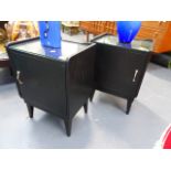 A PAIR OF BEDSIDE CABINETS.