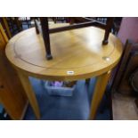 AN OAK BREAKFAST TABLE AND TWO CHAIRS.