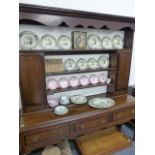 A LATE GEORGIAN OAK AND INLAID COUNTRY DRESSER WITH PLATE RACK.