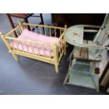 A DOLL'S HIGH CHAIR AND A DOLL'S COT
