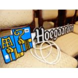 A HOEGAARDEN ILLUMINATED SIGN.