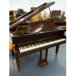 A GOOD QUALITY BABY GRAND PIANO BY MOLLINGTON.