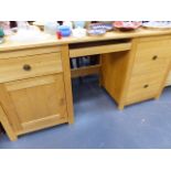 A LARGE OAK DESK.