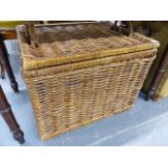 A WICKER HAMPER.