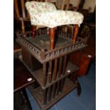 A REVOLVING BOOKCASE AND A FOOTSTOOL.