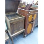 A MAHOGANY AND INLAID GRAMOPHONE CABINET AND AN OAK GRAMOPHONE CABINET.