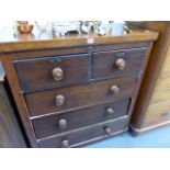 A SMALL VICTORIAN MAHOGANY CHEST OF DRAWERS.