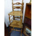 AN ANTIQUE ROCKING CHAIR AND A SIDE CHAIR.