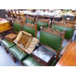 A SET OF SIX CARVED OAK DINING CHAIRS.