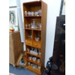 A GOOD QUALITY TEAK SHELF UNIT.