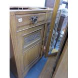 A LATE VICTORIAN OAK BOOKCASE.