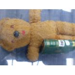 A BLUE RIBBON VINTAGE MUSICAL PLUSH BEAR TOGETHER WITH A CHAD VALLEY TIN.