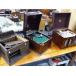 TWO TABLE TOP GRAMOPHONE CASES FOR RESTORATION AND AN HMV RADIOGRAM.