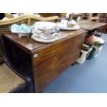 A LATE GEORGIAN MAHOGANY GATELEG TABLE.