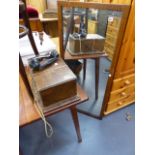 A MAHOGANY AND INLAID MIRROR AND AN OCCASIONAL TABLE.