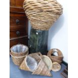 VARIOUS FLOWER BASKETS AND A METAL STAND.