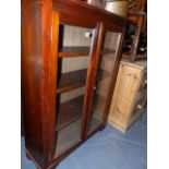 A MAHOGANY BOOKCASE.