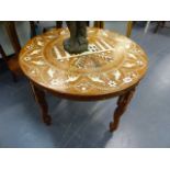 AN EASTERN INLAID OCCASIONAL TABLE.
