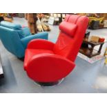 A RETRO RED LEATHER ROCKING ARMCHAIR.