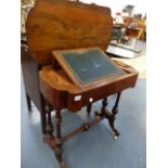 A VICTORIAN WALNUT FITTED WORK TABLE.