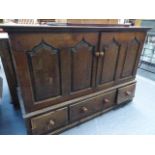 AN 18th.C.AND LATER OAK CABINET.